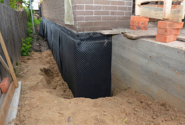 Happy homeowners after waterproofing job in Bluffton